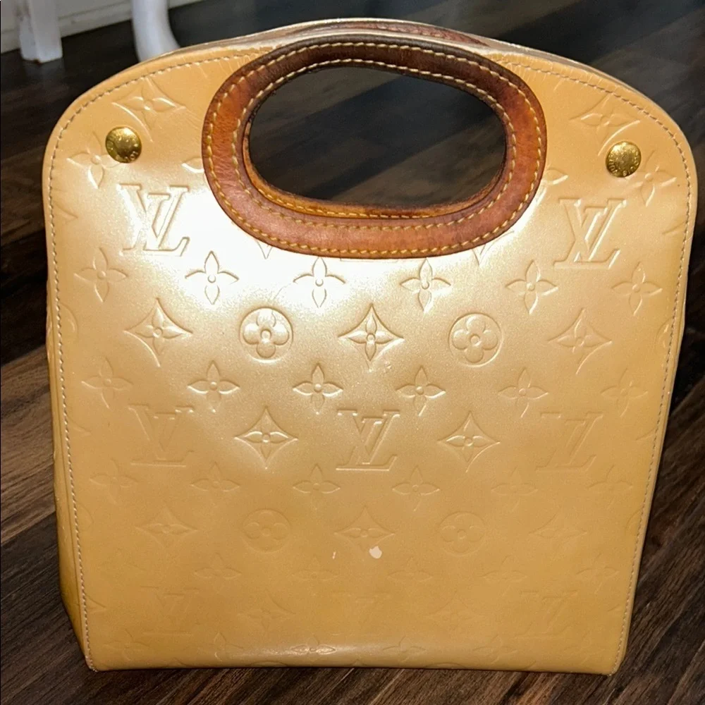 LOUIS VUITTON Gold Tote with Iconic Embossed Design